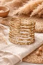 brazalete fino dorado.webp